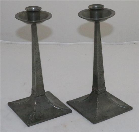 A pair of James Dixon & Sons planished pewter candlesticks, 8.75in.